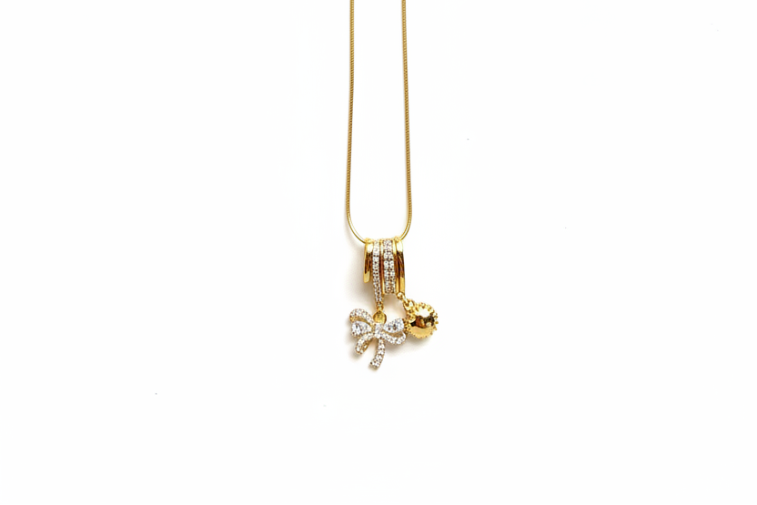 Sun star Bow charm neckchain